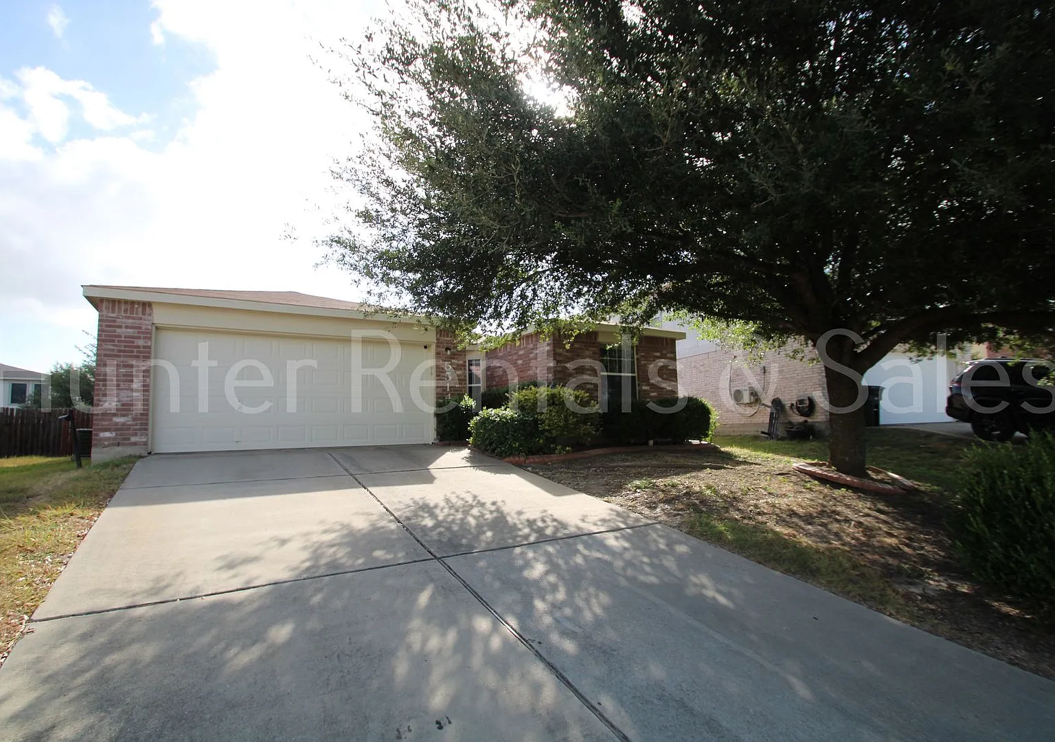 Charming 3-Bedroom Home with Fireplace, Spacious Primary Suite & Covered Deck — Photo 2