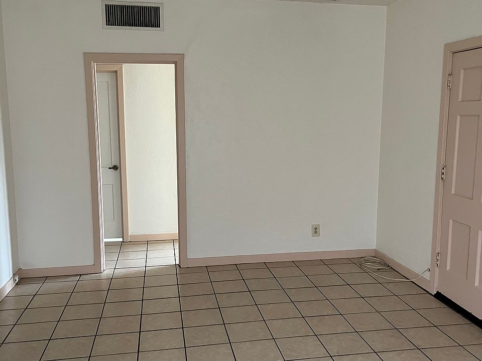 Living room to hall (front door on the right)