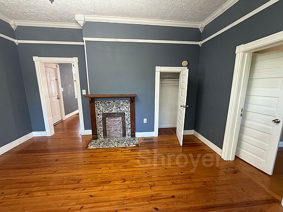 Living room or bedroom with full closet