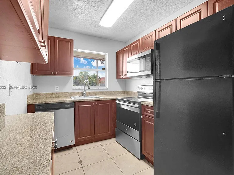 400 NW 65th Ave #213 — Photo 18