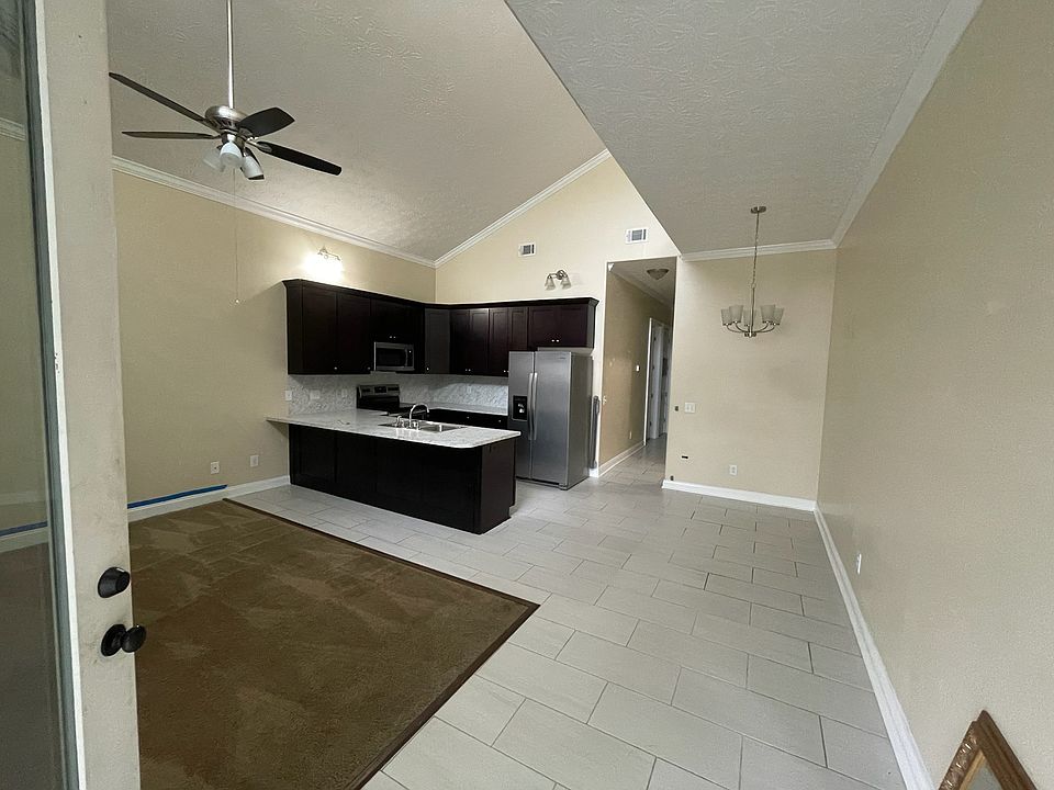 Front Entrance - Living Room, Dinning and Kitchen Area