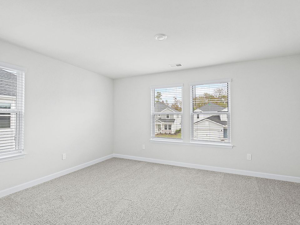 Spacious secondary bedrooms offer plenty of room for the whole family and overnight guests.