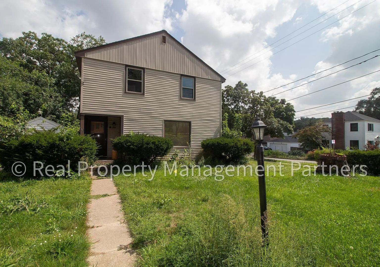 4-Bedroom Home Renovated Kitchen and 4-Season Sunroom on a Corner Lot — Photo 3