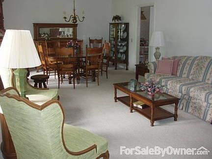 view from kitchen into family room
						:
						The open feeling with the combined family room, kitchen, and eating area.