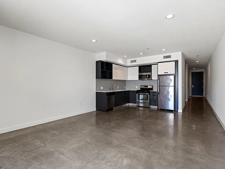 Open-Concept Kitchen, Dining, and Living Room Spaces
