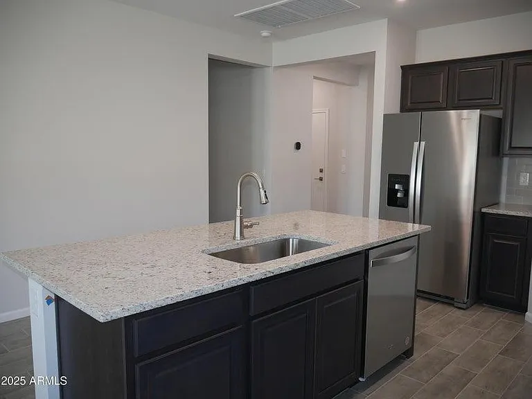18156 W Daley Ln — Photo 6