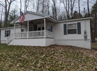 210 Harvey Ave, Houghton Lake, MI 48629