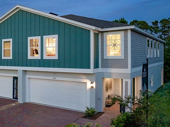 Mustang end unit at Blue Springs Reserve by Trinity Family Builders