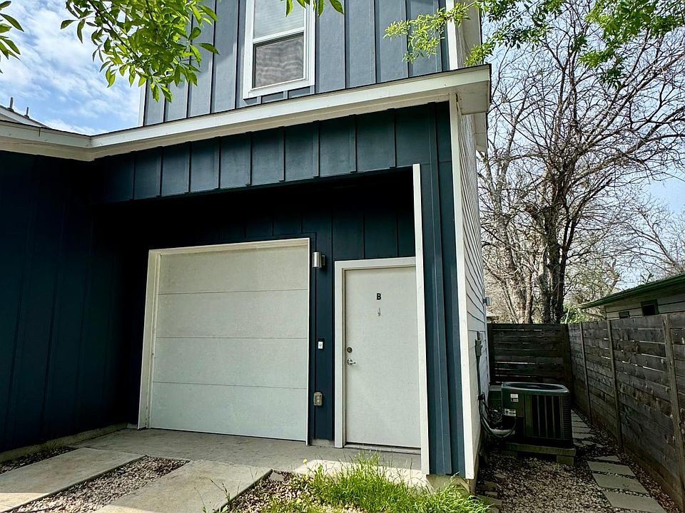 Exterior has door into garage as well as entrance on side