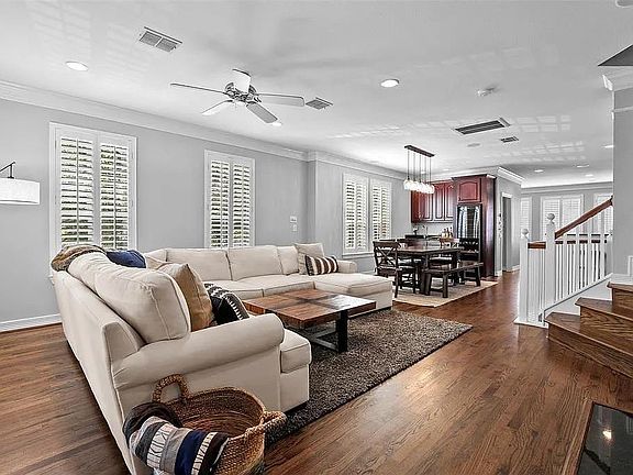 Open concept living room. Balcony and Grill off the living room