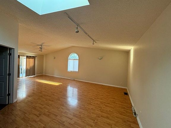 2nd view of great room w/ door to Main Suite