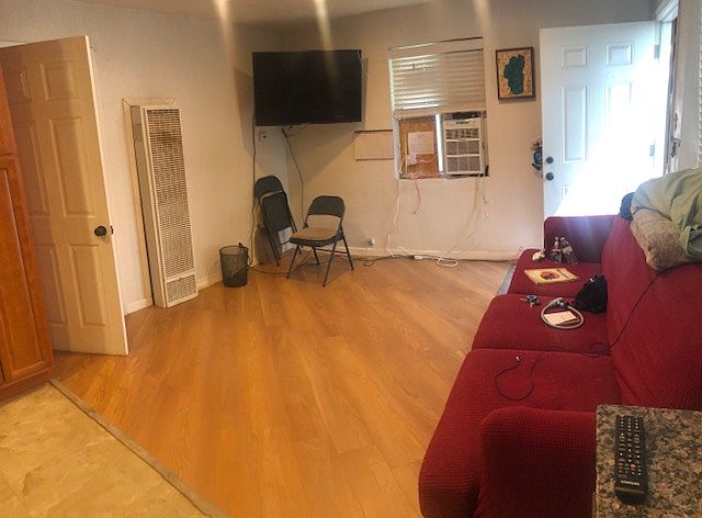 living room with 55 inch Samsung