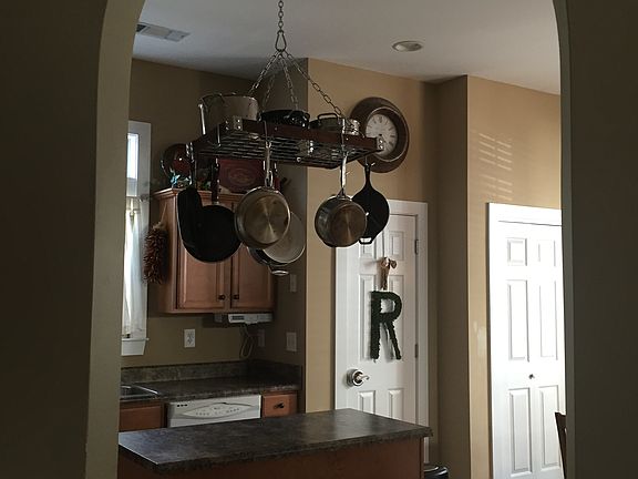 Den- looking into kitchen