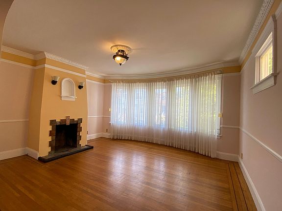 Living Room with Decorative Fireplace