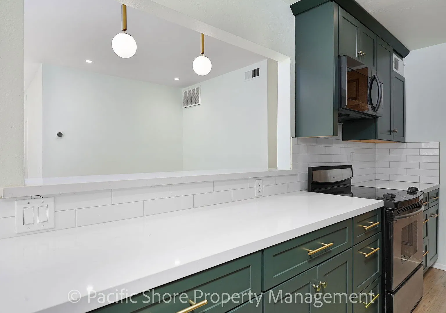 Stunning Remodeled 2-Bedroom Condo in Brentwood with Private Balcony & Pool! — Photo 4