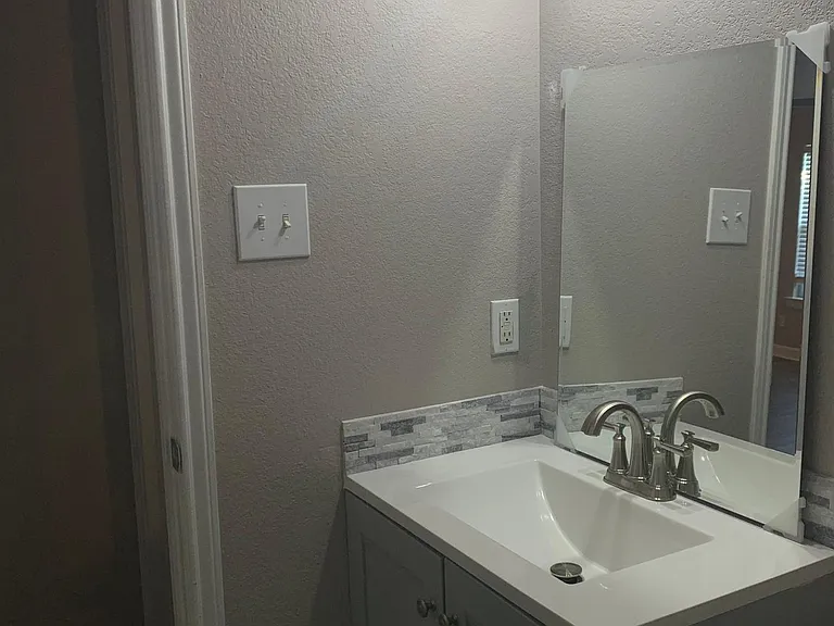 Bathroom has been finished, photos show while it was under renovation