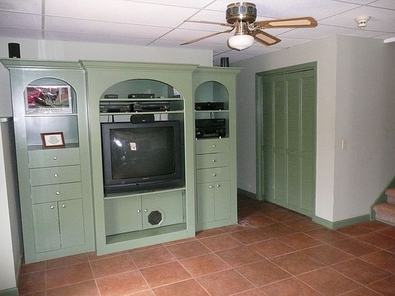 BUILT IN ENTERTAINMENT CENTER IN BASEMENT