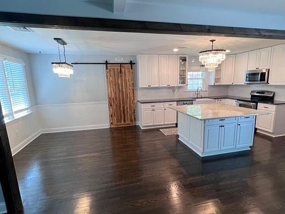 Spacious kitchen with plenty of countertop space and storage