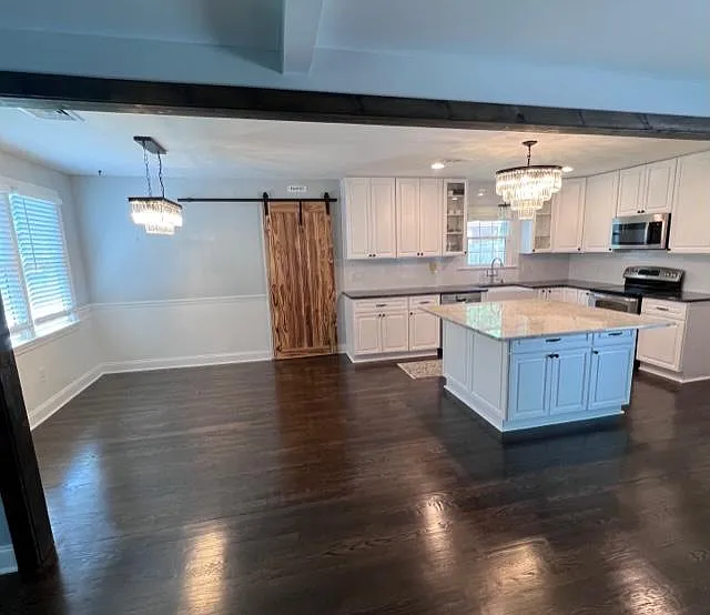 Spacious kitchen with plenty of countertop space and storage