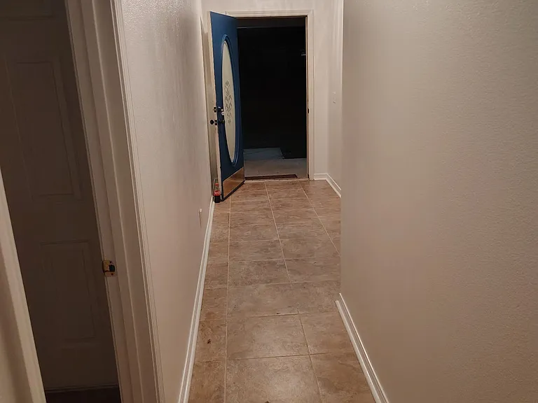 View toward front door. Doorway on left is to laundry room which leads to garage.