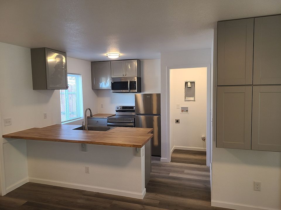Kitchen with niche for washer and dry hookups (Washer/Dryer units not provided).
