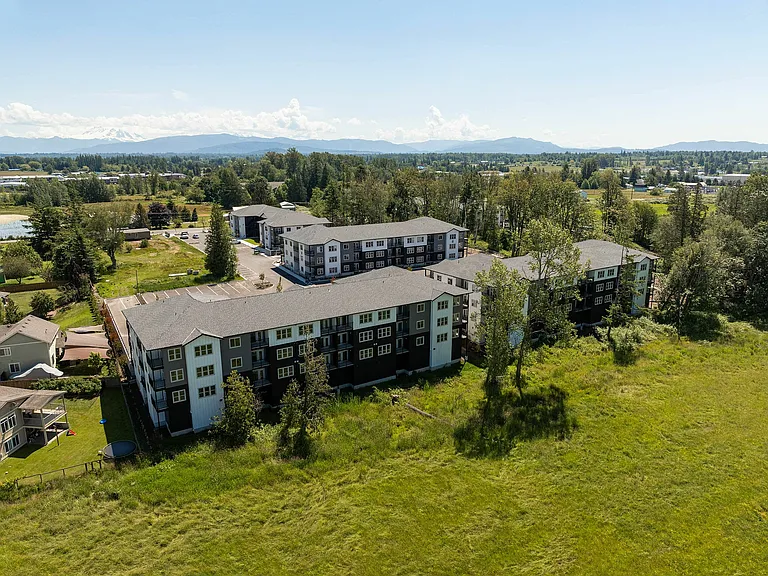 Mount Baker in the distance and green space views available.