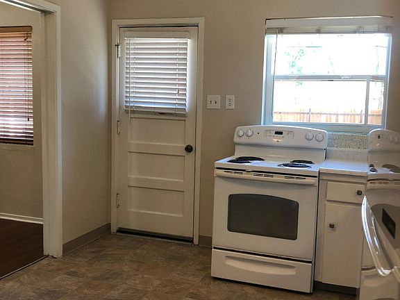 Large kitchen w/spacious cabinets, new flooring