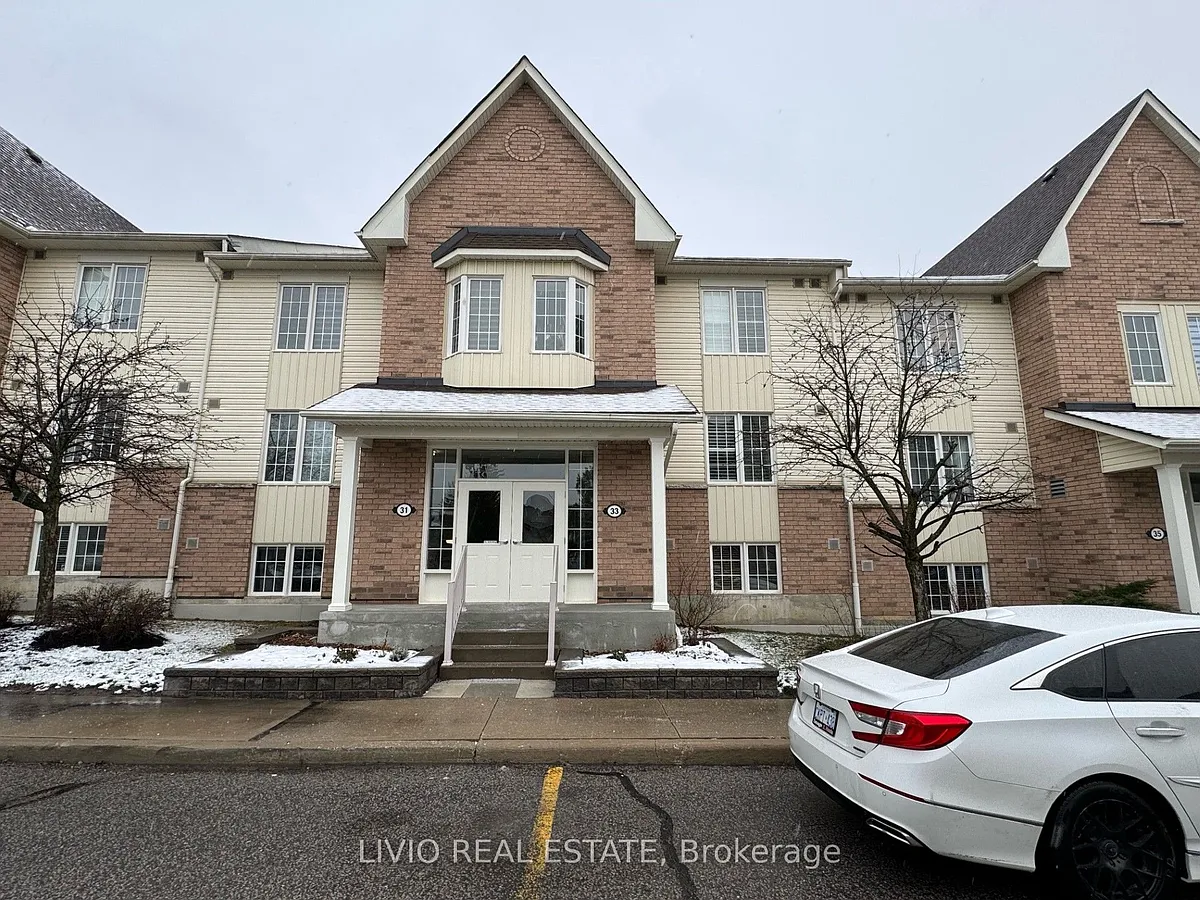 Building Photo - 33 Petra Way #1