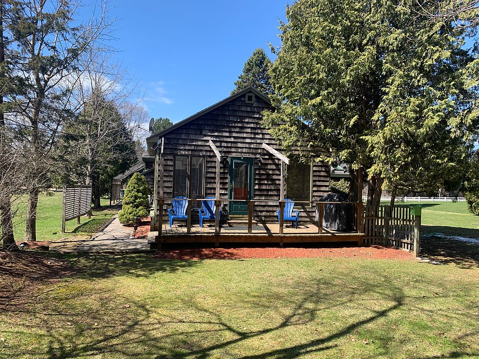 Private entrance, deck, patio, and backyard.