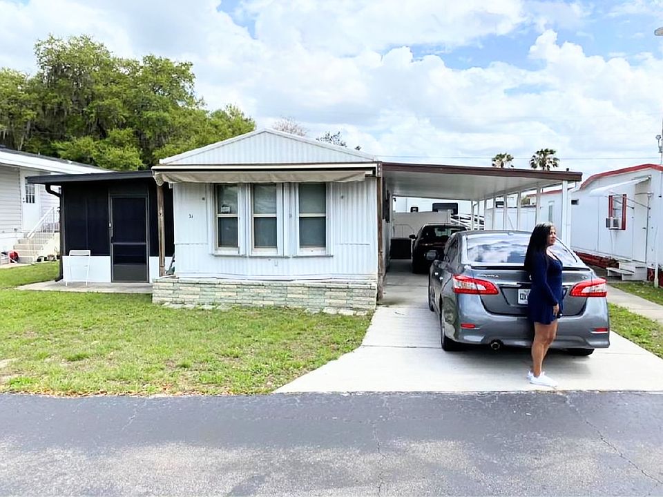 2 Bedroom 2 Bath Home With Carport & Attached Sunroom- Don't miss the October Move-In Special!