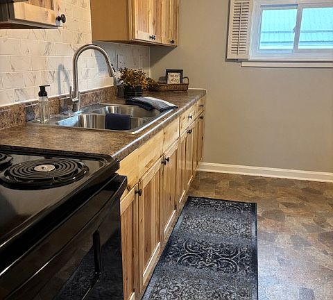 Brand new, deep sink, with new faucet