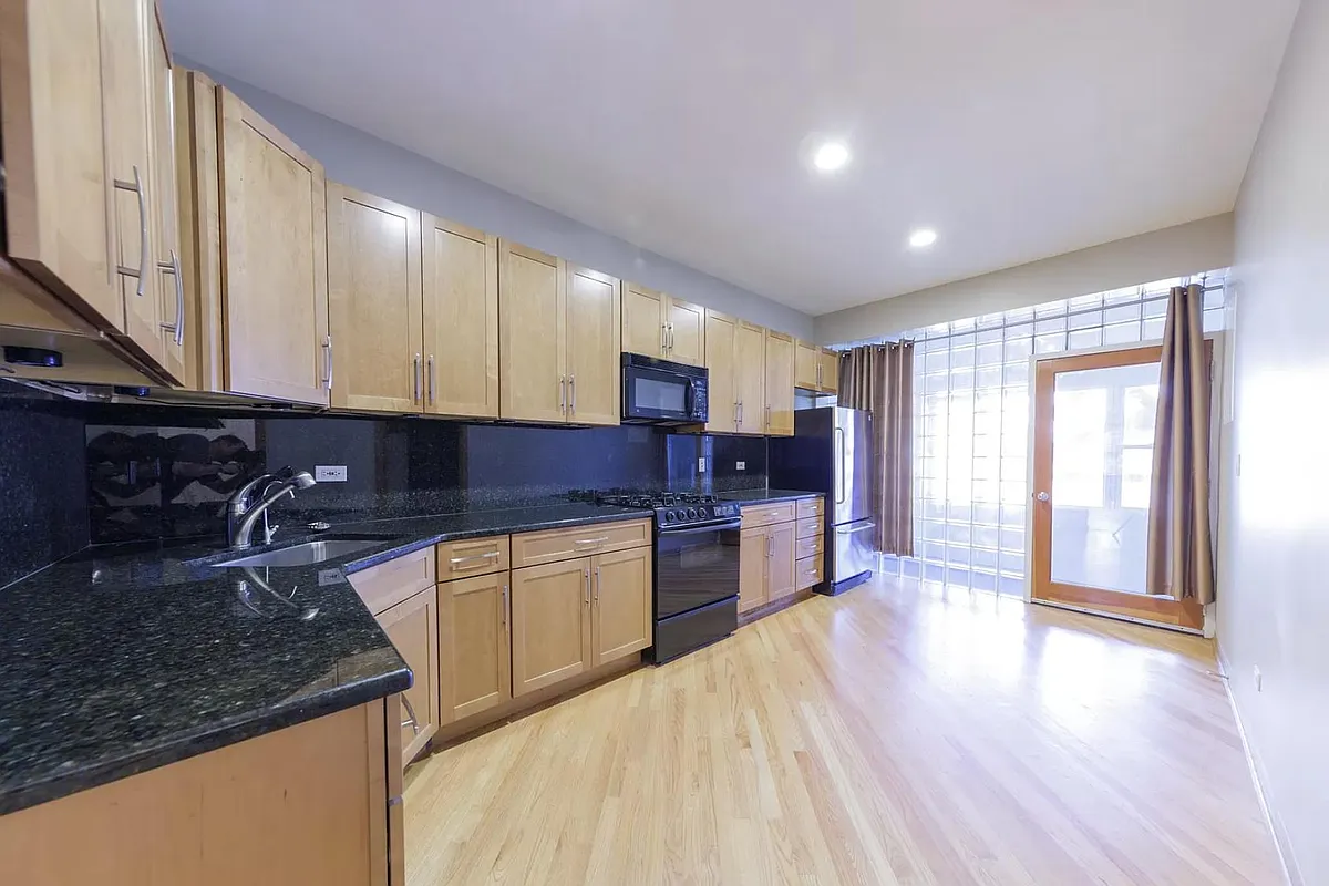 Building Photo - 1747 N Honore St #1