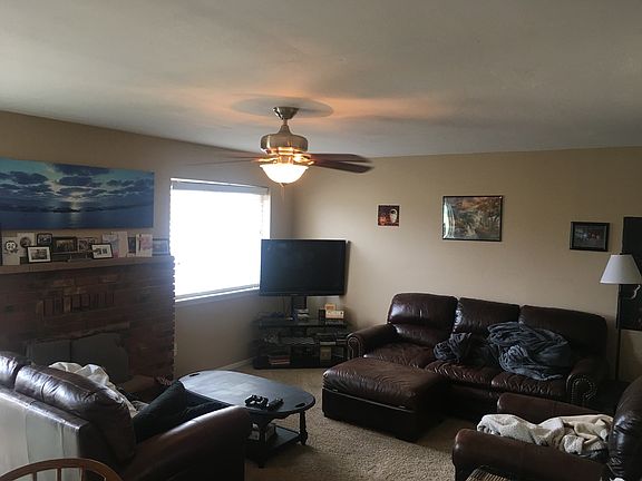 Open floor plan on main level with Dining, kitchen, and Livi