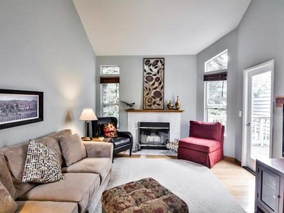 Living room with vaulted ceilings
