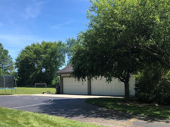 3-1/2 Car Garage 2 Basketball Hoops Trampoline Soccer Goal