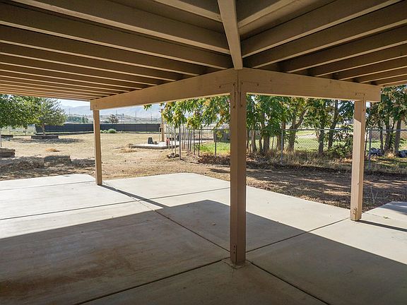 Large rear patio with views.