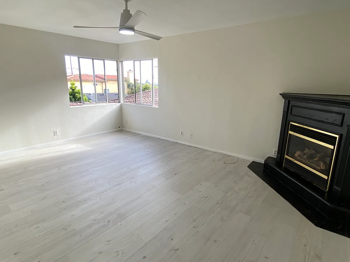 Living room with gas fireplace - 210 1/2 N Prospect Ave