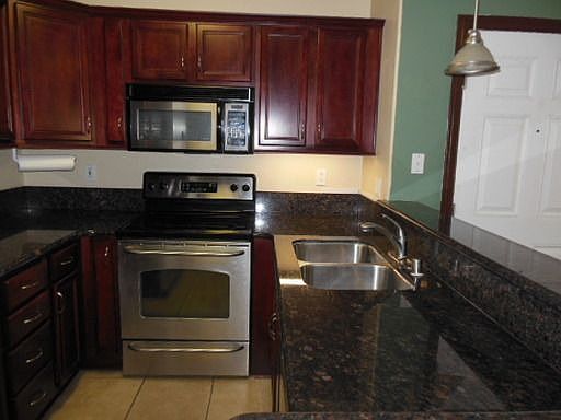 3rd image of 5402 Balboa Arms Dr Unit 420
