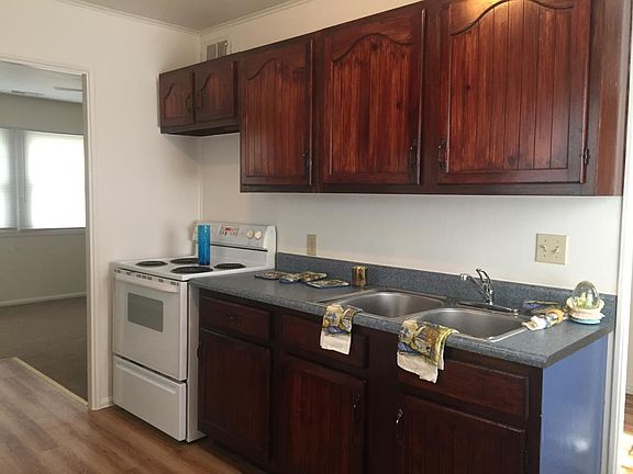 Chefs kitchen with new flooring solid wood cabinetry refrige