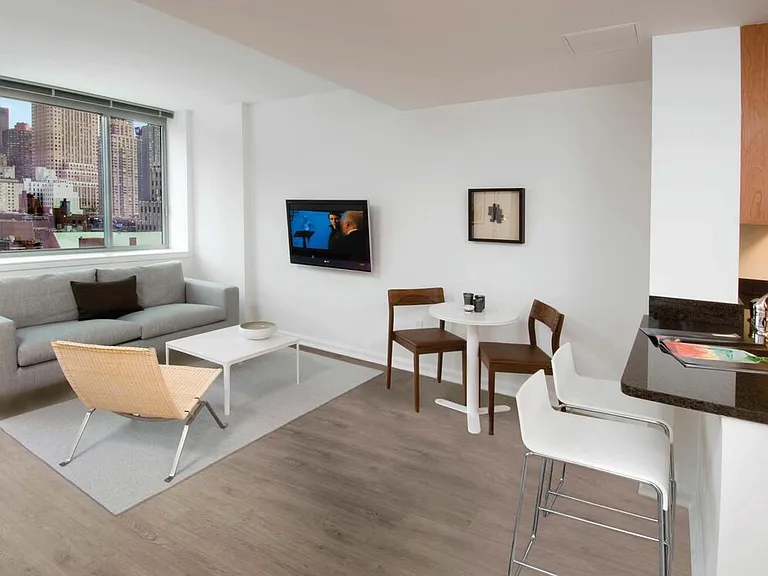 Classic II North dining and living room with hard surface flooring