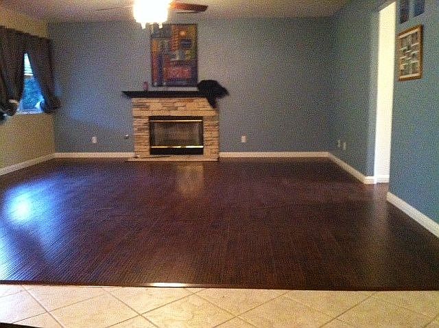 Replaced carpet with wood.