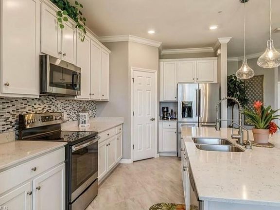 3rd image of 202-11784 Grand Belvedere Way #202