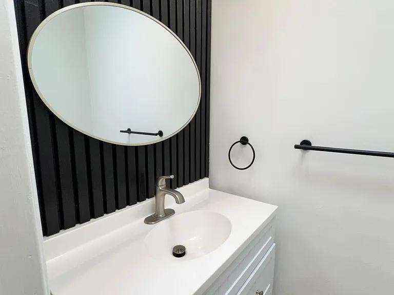 Half bathroom in hallway