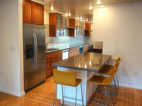 Stainless steel appliances and kitchen bar