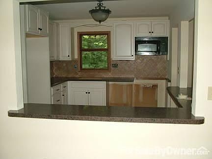 Kitchen : Stove and dishwasher will be installed prior to sale of house.