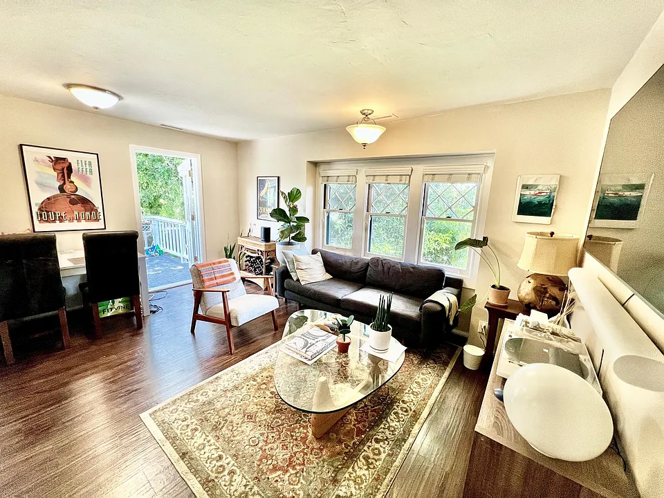 Living room and entrance to private deck.