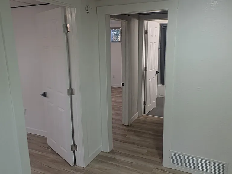 End on the basement living room/doors to bedrooms and bathroom