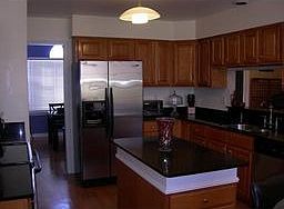 kit updated with quartz countertops & new SS appliances