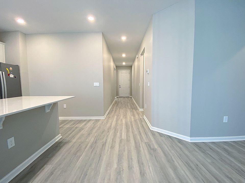 Open floor plan with long foyer