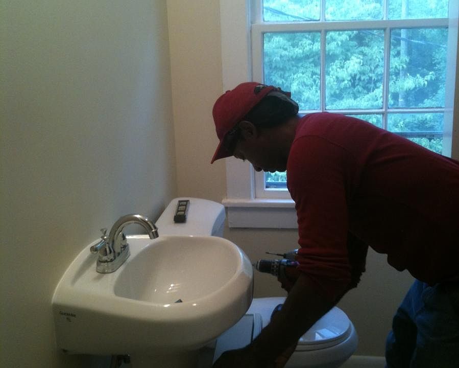 The bathroom was updated with tile surround and floor